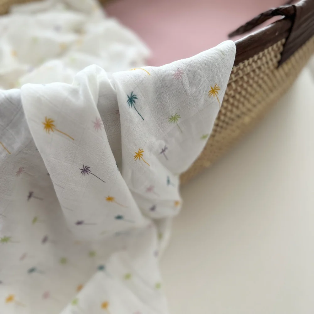 lange-joli-nous-cocotier-palmier-suisse-ete-swaddle-oeko-tex-gots-etoiles-en-portage1.jpg